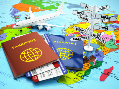 Travel or tourism concept. Passport, airplane, airtickets and de
